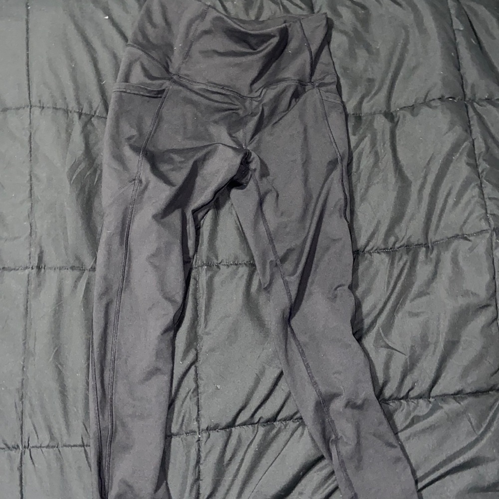 These are a size medium pair of black leggings from mta sport.